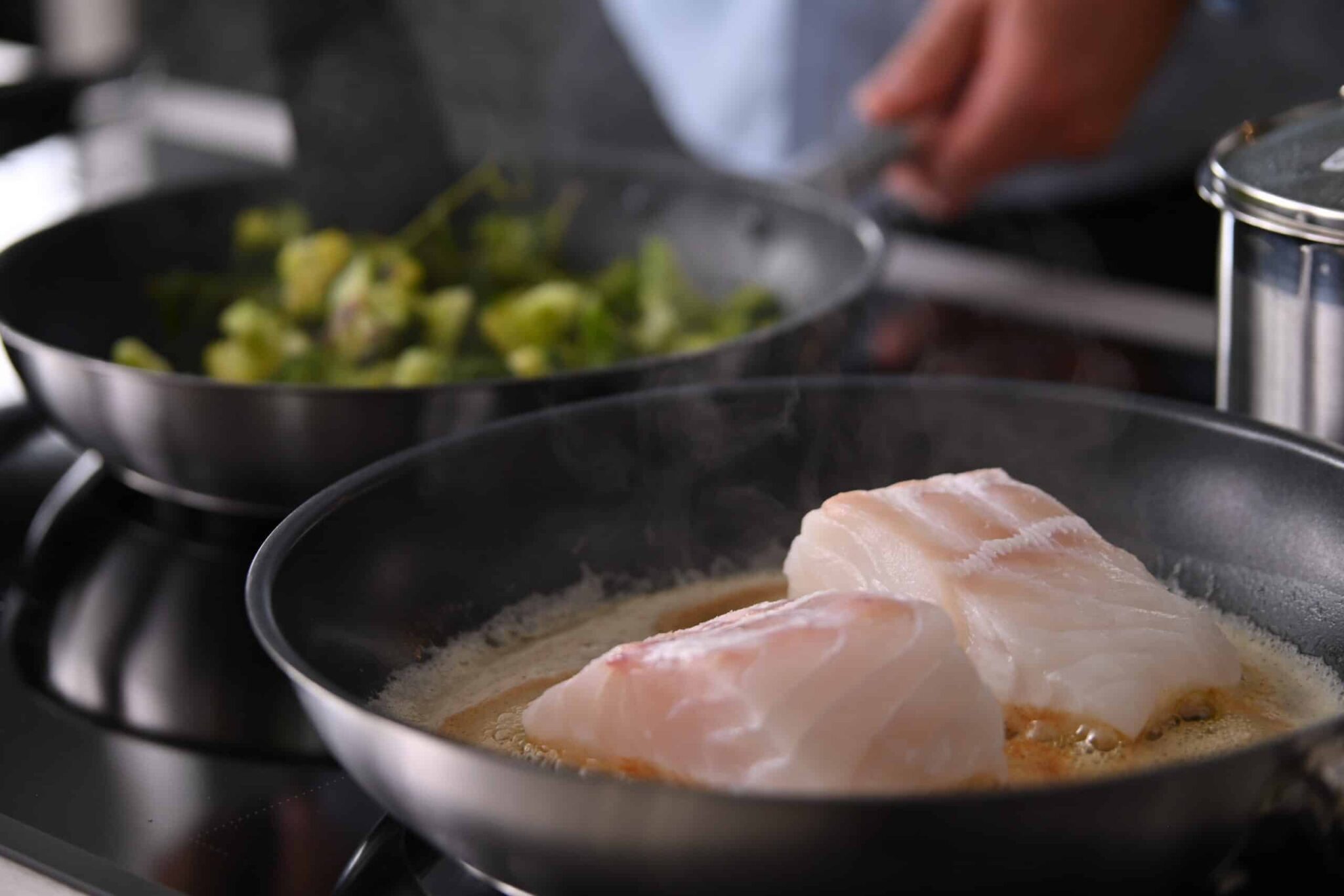 Cod being fried on a Ztove non-stick pan